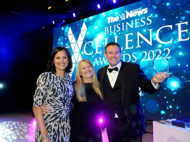 The News Business Excellence Awards 2022. Pictured is: (l-r) awards host Anjana Gadgil, sponsor Jo Sawford, business director at Solent LEP with Overall Business of the Year winner Daryn Brewer from Pro Pods. Picture: Sarah Standing
