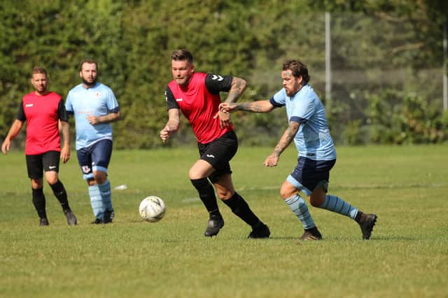 Wymering (red) v Portchester Rovers. Picture: Kevin Shipp