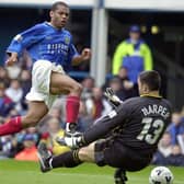 Kevin Harper sees a shot blocked by QPR keeper Lee Harper during the 2000-01 season.