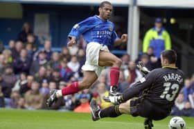 Kevin Harper sees a shot blocked by QPR keeper Lee Harper during the 2000-01 season.