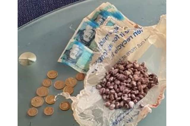 Police found crack cocaine, heroin and money at an address in Brighton. Picture: Sussex police.