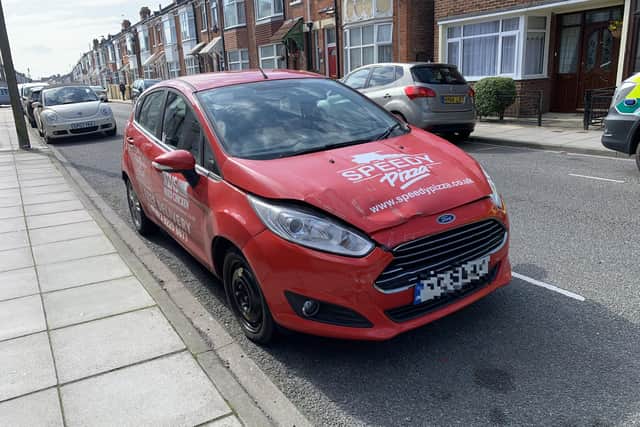 Police and an ambulance in St Augustine Road in Southsea after a head-on crash at around 10.38am. The victim's red Ford was hit by a black Ford Focus. Picture: Ben Fishwick