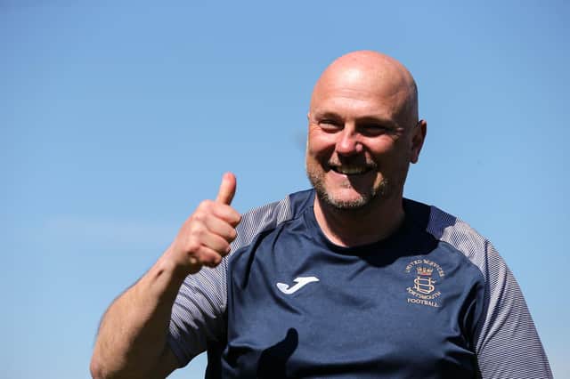 Glenn Turnbull all smiles after an FA Vase victory for US Portsmouth against Christchurch last April. A new challenge awaits him at Moneyfields in 2021/22. Picture: Chris Moorhouse