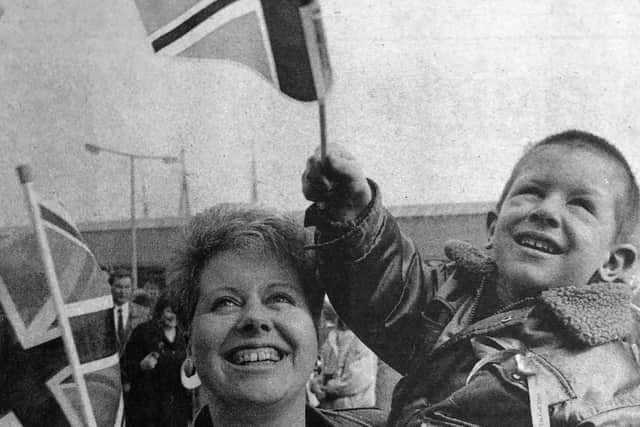 Sharon Lomas and son Paul get out the flags for the return of Petty Officer Steve Lomas.