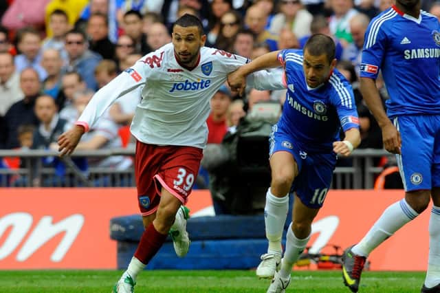 Pompey's flying full-back Nadir Belhadj takes on Chelsea's Joe Cole in the 2010 FA Cup Final