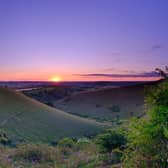 Glorious Hampshire countryside. Clanfield  - July 28, 2020:  Summer sunset over the South Downs from Butser Hill near Petersfield.