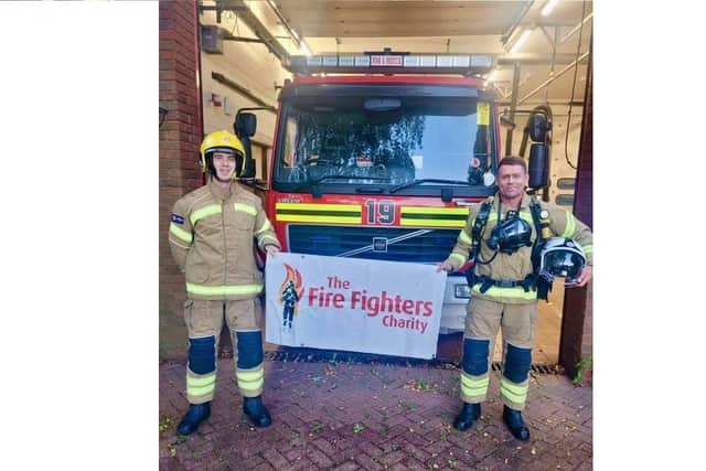 Firefighters Matt Burfoot (left) and Craig Sadler (right) who will run the Great South Run for the Portsmouth Down Syndrome Association. Picture: PDSA