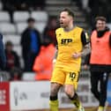 Ex-Pompey striker Chris Maguire celebrates in Lee Johnson's face last night. (Photo by Stu Forster/Getty Images)