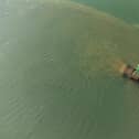 Southern Water's Budds Farm outfall photographed pouring out untreated sewage at 3.42pm on October 21 2021. Picture: Chris Pearsall Commercial Photography