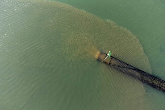 Southern Water's Budds Farm outfall photographed pouring out untreated sewage at 3.42pm on October 21 2021. Picture: Chris Pearsall Commercial Photography