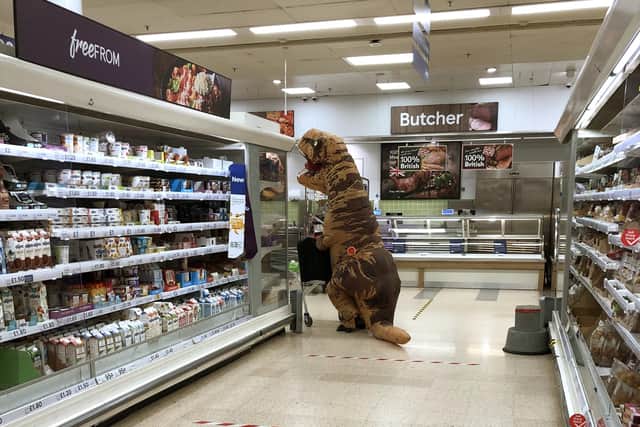 A mystery man dressed as a Tyrannosaurus rex does his shopping at Tesco, North Harbour, on Tuesday, March 31. Picture: Kirsty Suthers