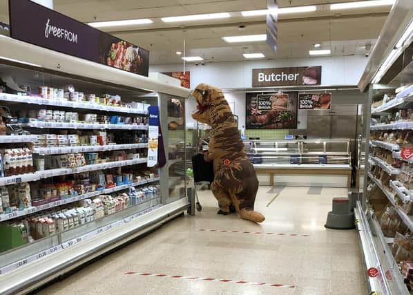 A mystery man dressed as a Tyrannosaurus rex does his shopping at Tesco, North Harbour, on Tuesday, March 31. Picture: Kirsty Suthers