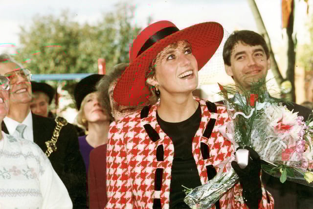 The Princess of Wales looks up at residents at Buckingham Green, Buckland, Portsmouth as their roar welcomes her, as she tours parts of Portsmouth after receiving the Honorary Freedom of the City on 16th October 1992