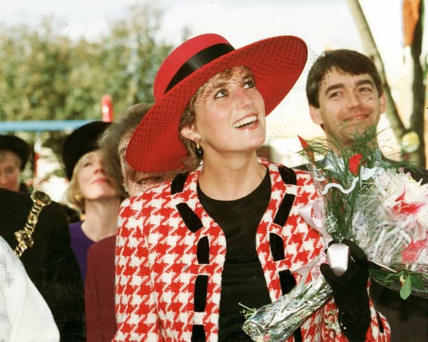 The Princess of Wales looks up at residents at Buckingham Green, Buckland, Portsmouth as their roar welcomes her, as she tours parts of Portsmouth after receiving the Honorary Freedom of the City on 16th October 1992