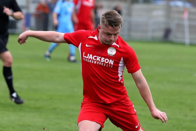 Horndean's Liam Kimber tries his luck against AFC Portchester. Picture: Sam Stephenson