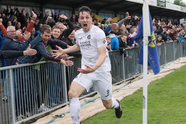 Dorking striker Jason Prior celebrates the goal that clinched the National League South title for Hawks in 2017/18.