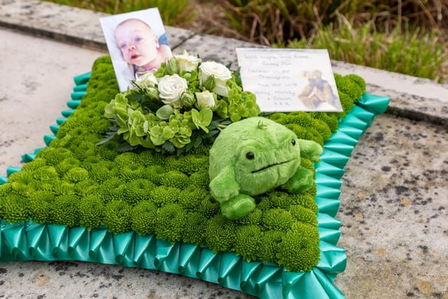 A flower arrangement featuring a frog, in reference to Jax's nickname "The Little Frog". Picture: Mike Cooter (160324)