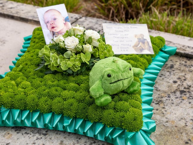 A flower arrangement featuring a frog, in reference to Jax's nickname "The Little Frog". Picture: Mike Cooter (160324)