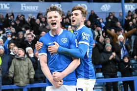 Terry Devlin celebrates with Zak Swanson after scoring the opening goal against QPR on Boxing Day. Picture: Graham Hunt/ProSportsImages