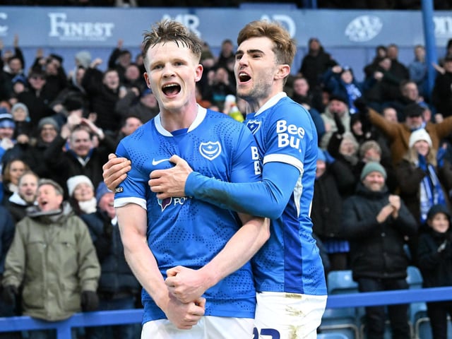 Terry Devlin celebrates with Zak Swanson after scoring the opening goal against QPR on Boxing Day. Picture: Graham Hunt/ProSportsImages