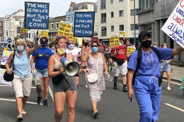 NHS health workers pictured protesting in Portsmouth over unfair pay. Photo: Tom Cotterill