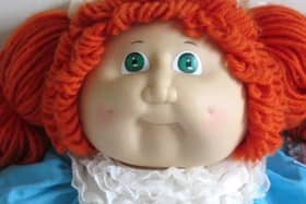 Lou's home DIY hair job turned out remarkably like this Cabbage Patch Doll