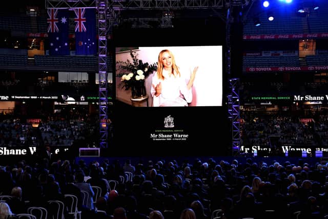 Singer Kylie Minogue speaks via video link during the state memorial service for Shane Warne. Photo by William WEST.