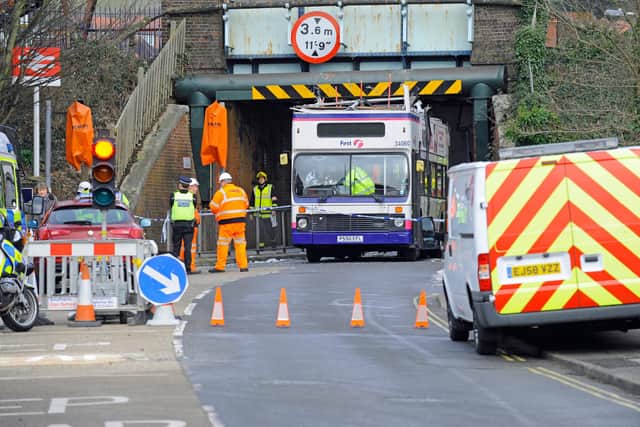 A double decker bus crashed into the bridge in Station Road, Portchester, in 2013. Picture: Malcolm Wells (13245-8992)