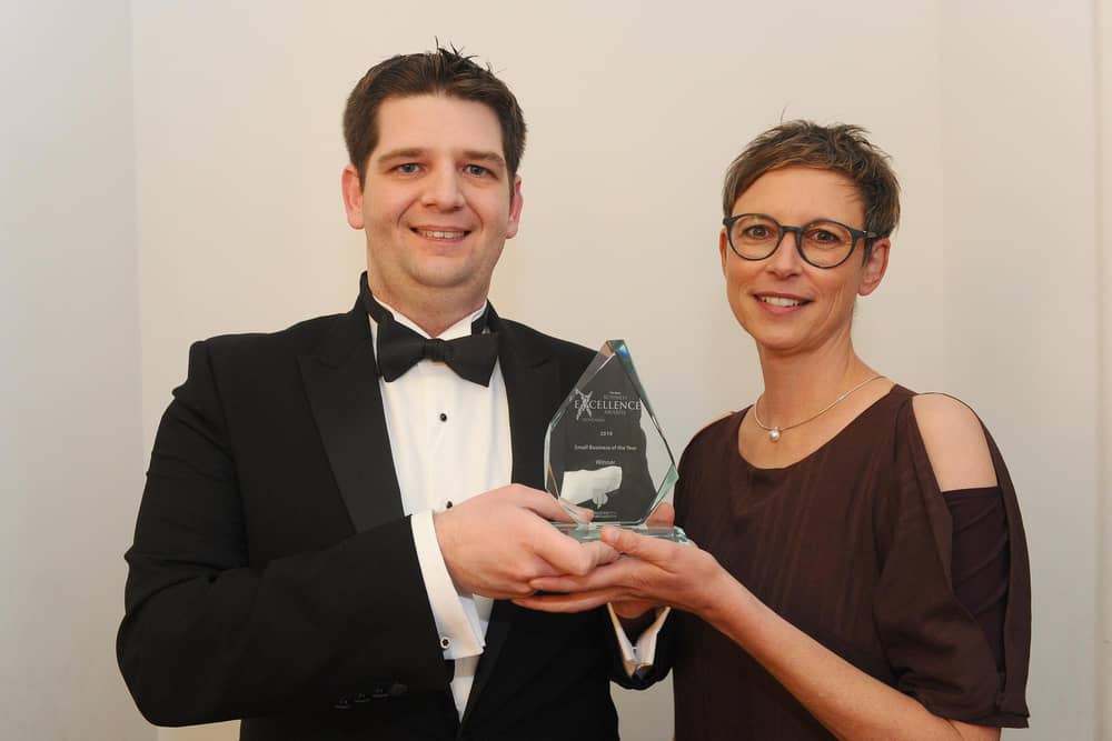 Stewart Woolston of the Chilli Mash Company in Hilsea, winner of Small Business of the Year in 2019, with Professor Martina Battisti from category sponsor the University of Portsmouth Business School