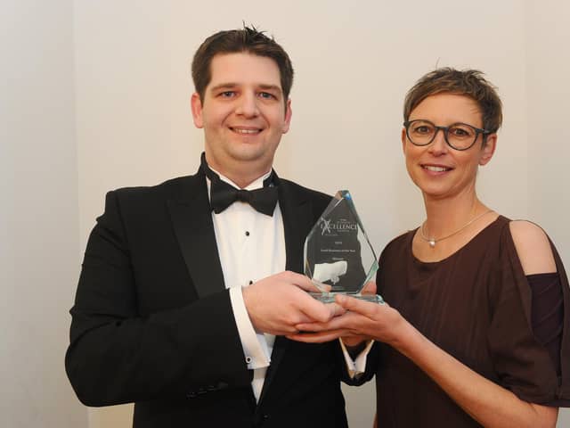 Stewart Woolston of the Chilli Mash Company in Hilsea, winner of Small Business of the Year in 2019, with Professor Martina Battisti from category sponsor the University of Portsmouth Business School