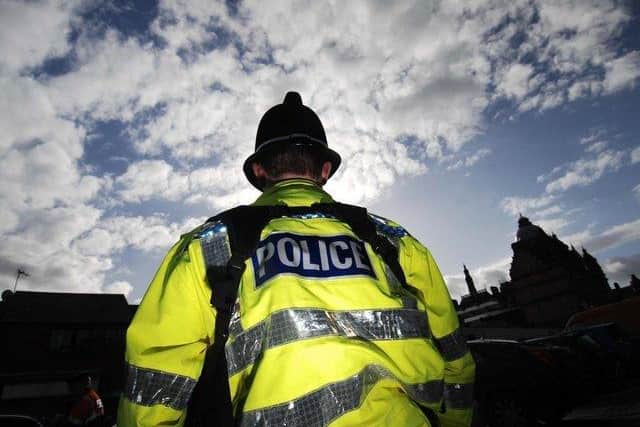Police have arrested two people over theft from a van.