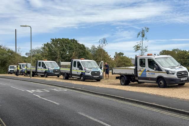 Travellers get a dusty welcome at a field in Rowner, Gosport on Monday. Gosport council vehicles surrounded the area shortly after the first caravans arrived to block further access.
