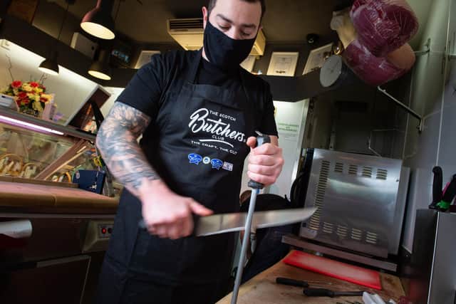 Buckwells of Southsea, in Osborne Road, supporting the Scotch Butchers Club. Tommy Bridle in action.