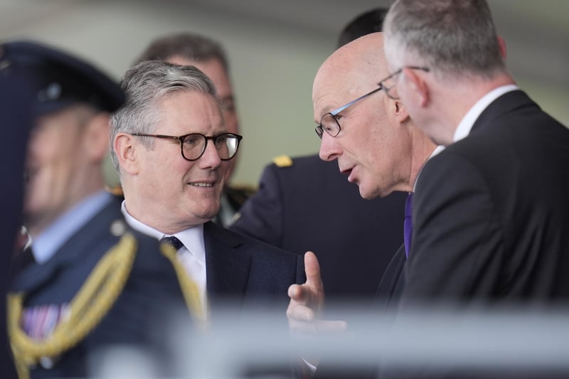 Labour leader Sir Keir Starmer (left) speaks to First Minister John Swinney the UK's national commemorative event for the 80th anniversary of D-Day, hosted by the Ministry of Defence on Southsea Common in Portsmouth, Hampshire. Photo credit should read: Andrew Matthews/PA Wire:D-Day