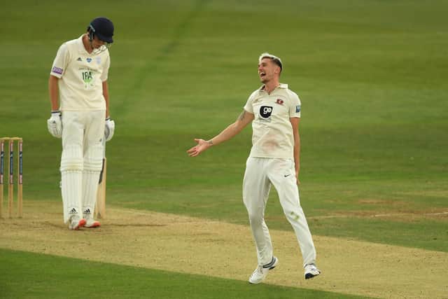 Kent's Harry Podmore celebrates the wicket of Scott Currie. Photo by Alex Davidson/Getty Images.