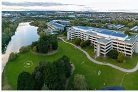 Lakeside aerial view with PV and helipad