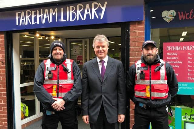Council leader Sean Woodward with the two security officers patrolling Fareham town center to support rough sleepers.