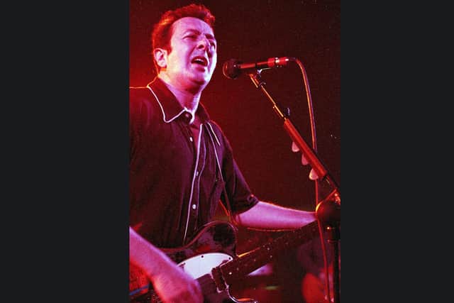 Joe Strummer performing at The Wedgewood Rooms in Southsea