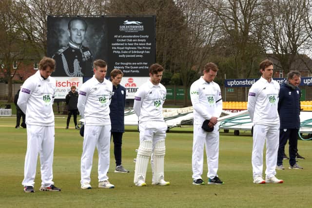 Leicestershire players during a two minutes silence for The Duke of Edinburgh before the start of this afternoon's session against Hampshire at Grace Road. Photo by Alex Pantling/Getty Images.