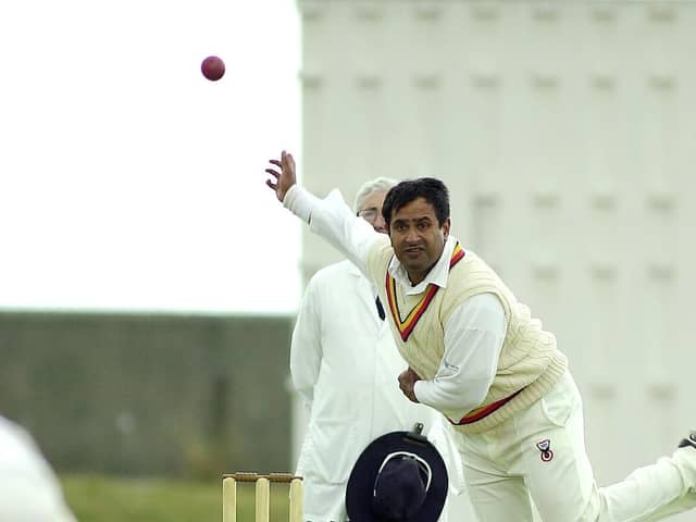 Raj Maru in bowling action for Portsmouth in 2001 against Hambledon at Southsea
