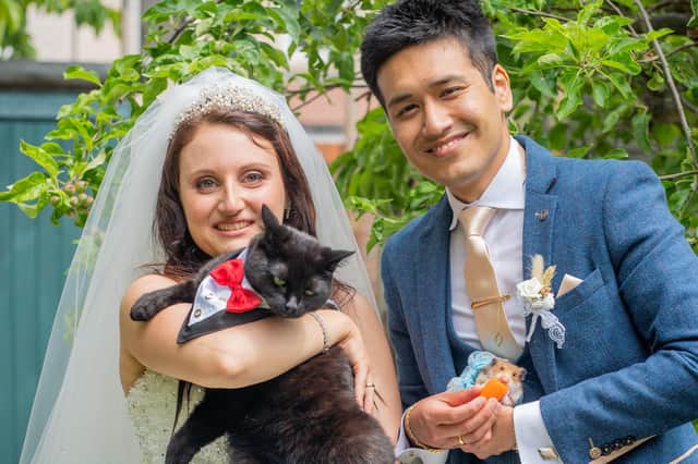 Shrijan and Asya with their cat Suzan and hamster Gus-Gus. Pictures: Carla Mortimer Wedding Photography, carlamortimerweddingphotography.co.uk