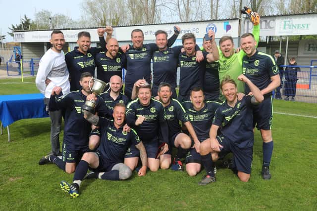 North End Cosmos celebrate their PDFA Veterans Cup final win over AFC Portchester.
Picture: Sam Stephenson.
