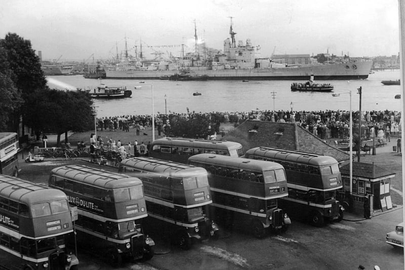 Provincial buses lined up at Gosport Ferry Gardens as HMS Vanguard leaves Portsmouth Habour for the last time in August 1960.