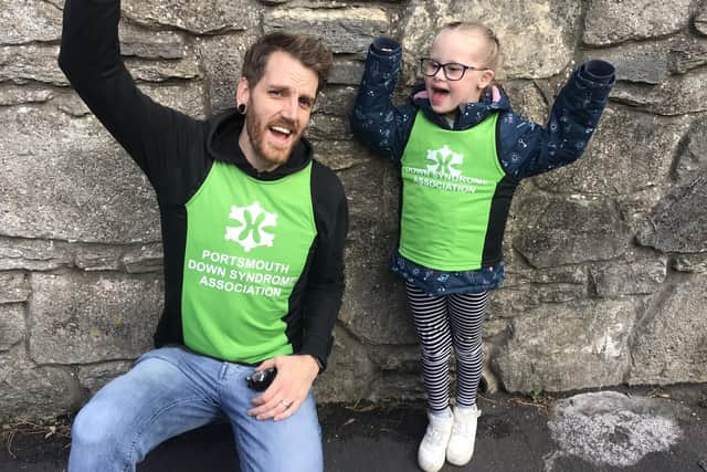 Ben Brooks is taking on a mile each day for 21 days using various methods of unusual transport to raise funds for Portsmouth Down Syndrome Association's T21 Challenge. Pictured: Ben with his daughter Robin, six, who has Down syndrome