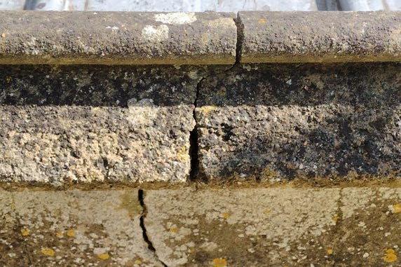 Significant crack through the parapet wall and coping. Image: Hampshire County Council