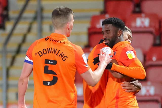 Jordy Hiwula, right, with Pompey team-mate Paul Downing