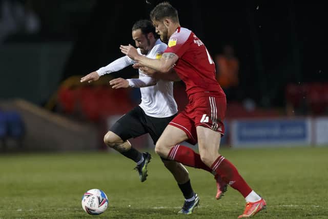 Ryan Williams is challenged by Cameron Burgess in the box in a key moment last night. (Photo by Daniel Chesterton/phcimages.com)