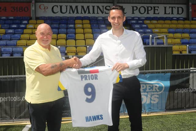 Returning Hawks striker Jason Prior, right, with chairman Derek Pope Picture: Dave Haines
