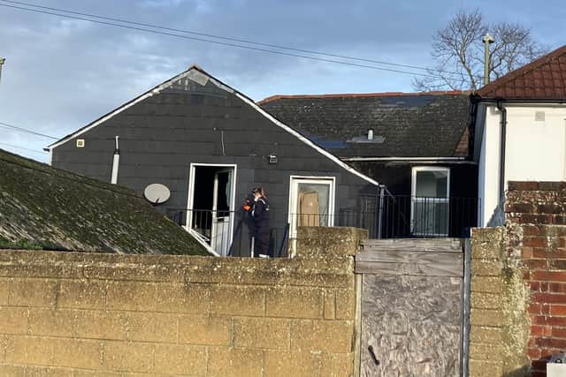 Police and fire investigators at a flat in Durham Street, Gosport, after a blaze at around 2.30am on January 1, 2022. Picture: Steve Deeks