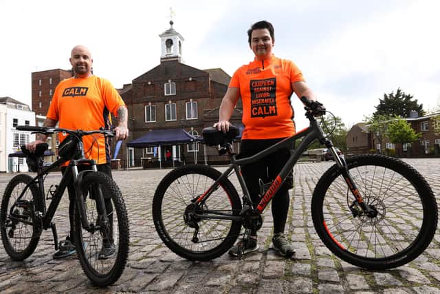 In February Kyle Gray, left, and Ash Gorin will be riding to North Wales, climbing Snowdon and riding back in aid of CALM, the suicide awareness charity. They are pictured near St George's Church, Portsea
Picture: Chris Moorhouse (jpns 160521-16)